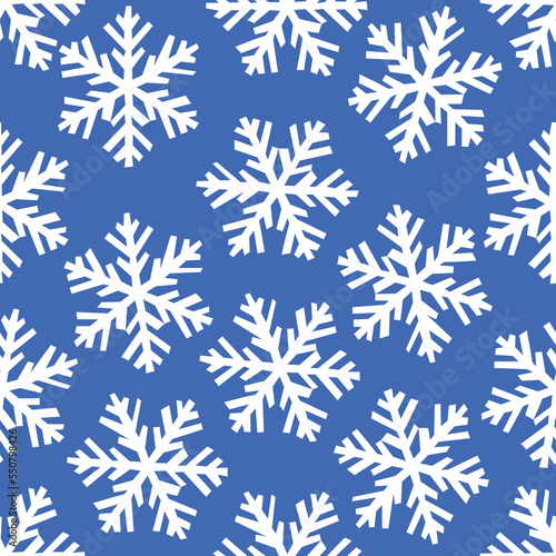 Vector seamless pattern with geometric snowflakes on a blue background