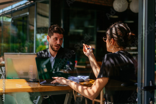 Business partners are working on their project seriously