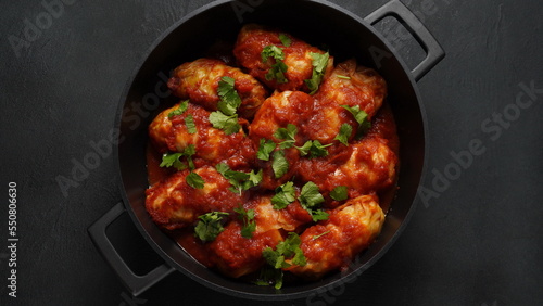 Stuffed cabbage rolls with and meat and tomato sauce.