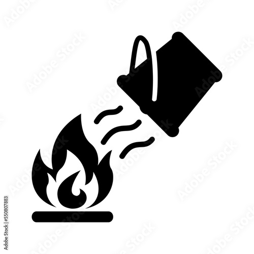 Water bucket extinguishing a fire