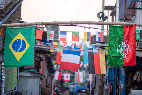 Soccer world cup participating country's flags are hanging in a city at Kolkata 