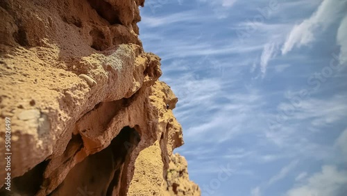 Sedimentary hallow Moroccon coastline rocks timelapse photo