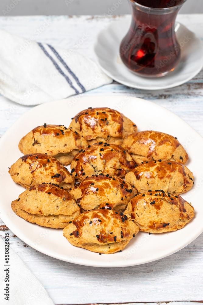 Cheese cookies. Sesame and cheese cookies on wood floor background. close up