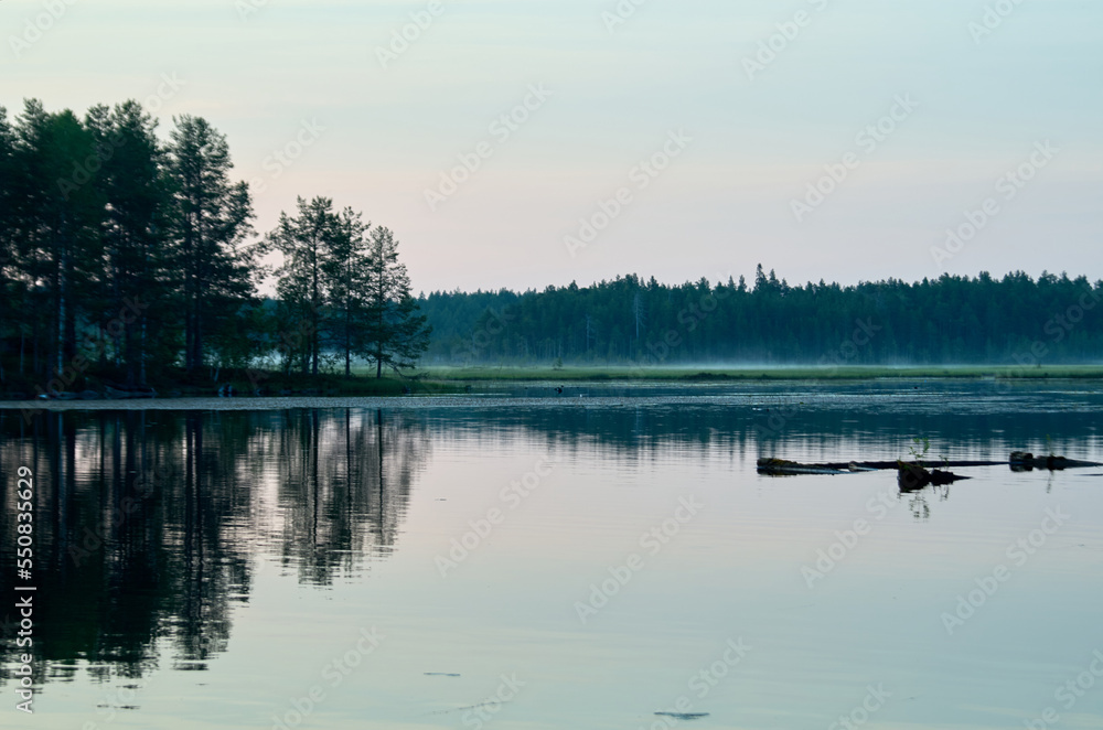 Summer river landscape with haze over the water Summer river landscape with haze over the water