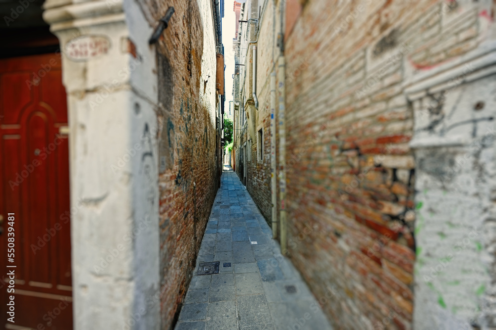 Narrow brick streets in Venice, Italy.