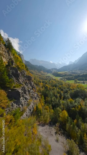 Mountain landscape in Switzerland in autumn. FPV aerial shot