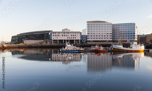 Trondheim coastal view. Fishing boats are moored in harbor © evannovostro