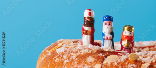 Leinwand Poster the wise men on top of a king cake, banner format