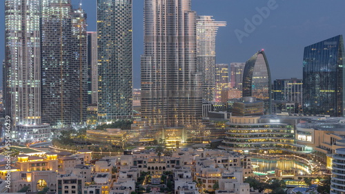 Dubai Downtown night to day timelapse with tallest skyscraper and other towers
