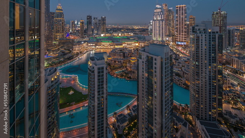 Принти на полотні Aerial panoramic view of a big futuristic city day to night timelapse