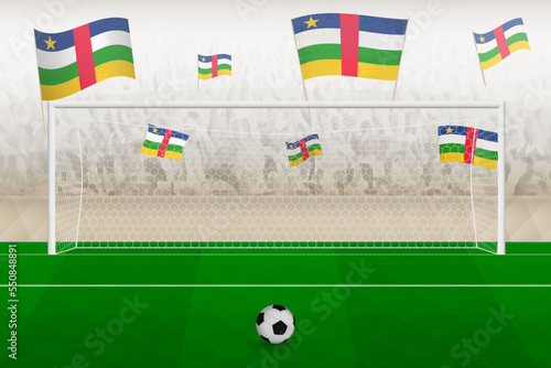 Central African Republic football team fans with flags of Central African Republic cheering on stadium, penalty kick concept in a soccer match.