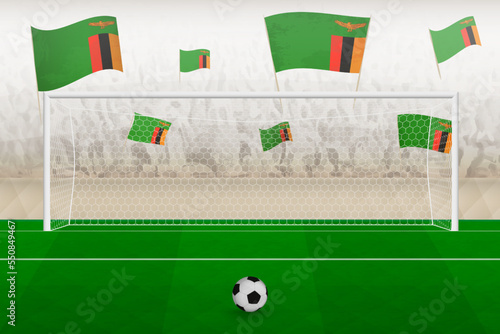 Zambia football team fans with flags of Zambia cheering on stadium, penalty kick concept in a soccer match.