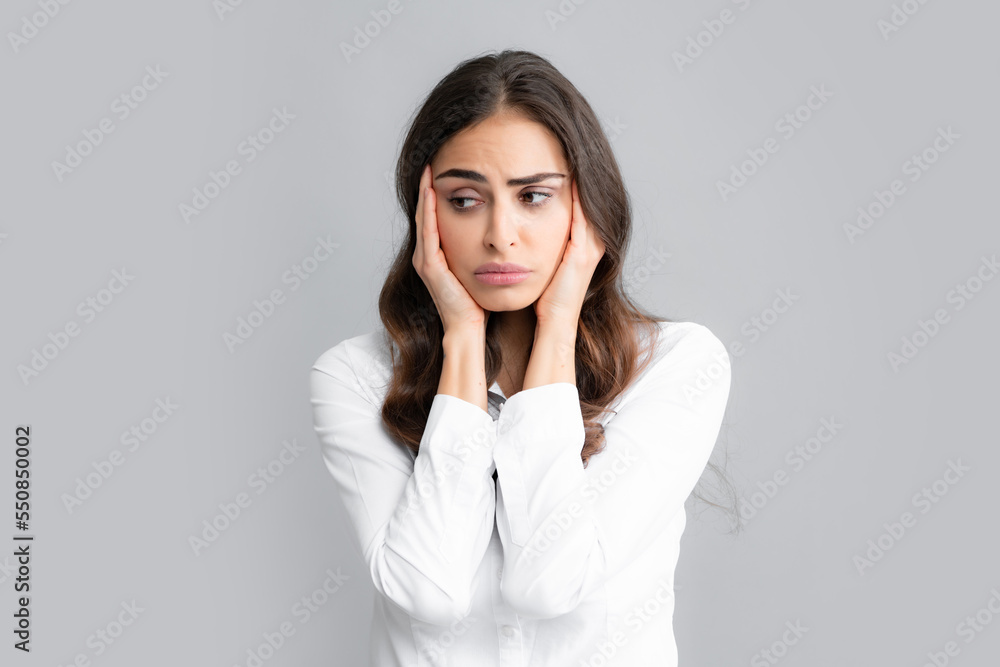 Portrait of young woman feeling stress or strain headache. Exhausted tired girl desperate and stressed because pain and migraine. Upset sad depressed model with hands on head. Portrait of young woman feeling stress or strain headache. Exhausted tired girl desperate and stressed because pain and migraine. Upset sad depressed model with hands on head.