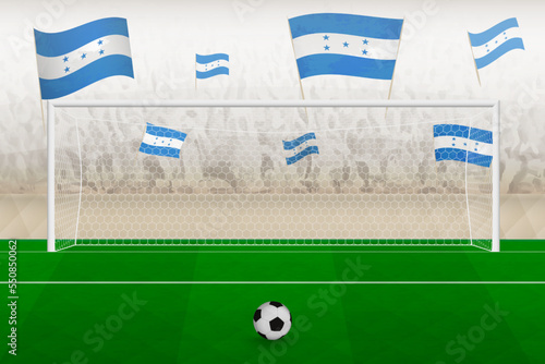 Honduras football team fans with flags of Honduras cheering on stadium, penalty kick concept in a soccer match.
