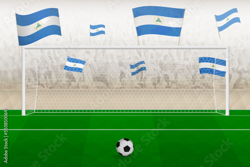 Nicaragua football team fans with flags of Nicaragua cheering on stadium, penalty kick concept in a soccer match.