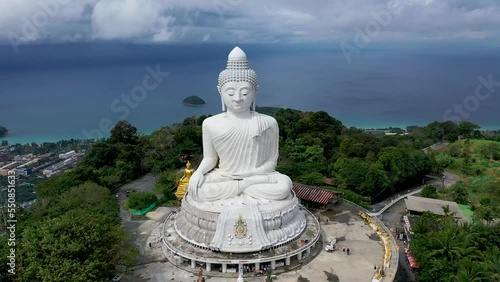 Famous White Big Buddha Marble Statue. Aerial Fly Away View. Phuket, Thailand photo