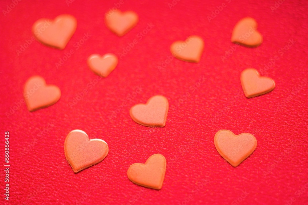 Lovely red hearts on red surface. Art love card Lovely red hearts on red surface. Art love card