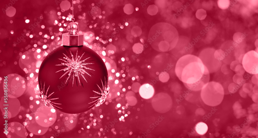 Festive Viva Magenta Background. Color of the 2023 Year. Christmas ball with gold stars on magenta background. Festive Viva Magenta Background. Color of the 2023 Year. Christmas ball with gold stars on magenta background.