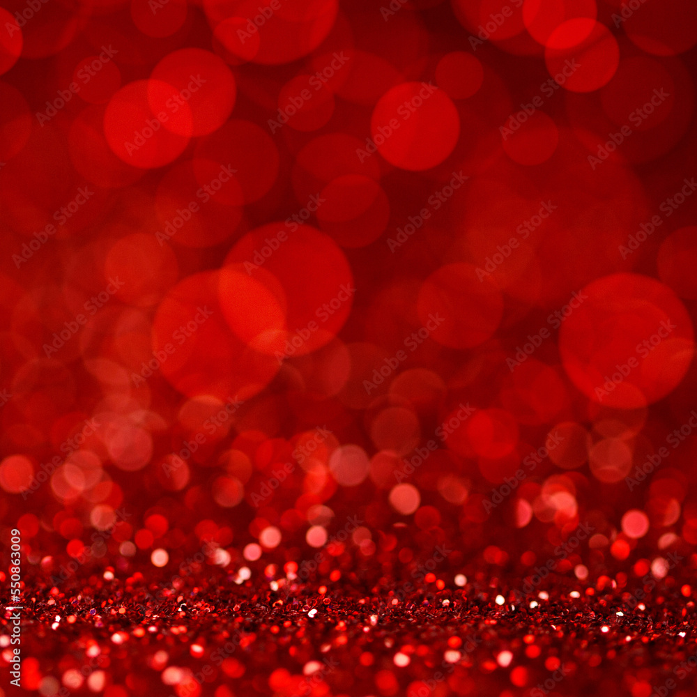 Abstract bokeh lights glittering red background