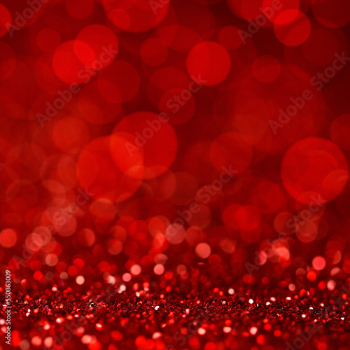 Abstract bokeh lights glittering red background