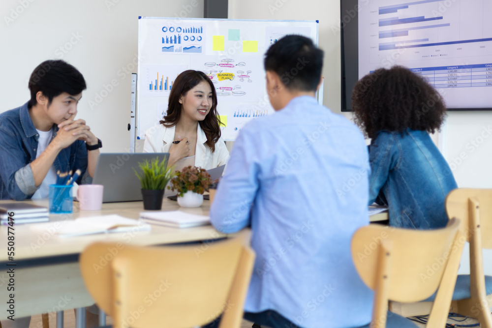 Young people meeting to discuss successful business projects in the office. Human relations and working with colleagues in the organization happily. Young people meeting to discuss successful business projects in the office. Human relations and working with colleagues in the organization happily.