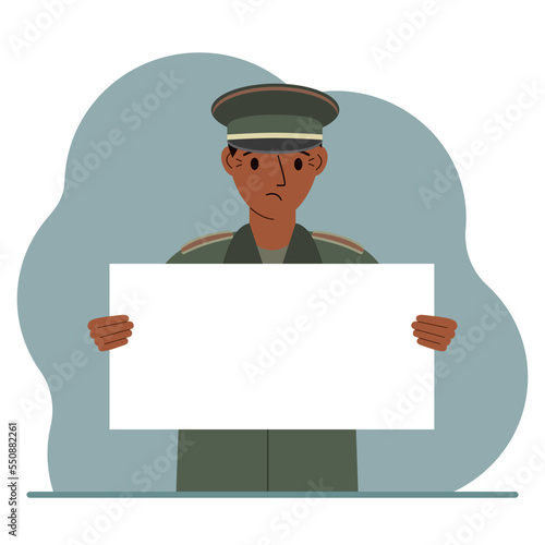 A military man in uniform holds a white sheet of paper in his hands. Concept for advertising, poster, banner.