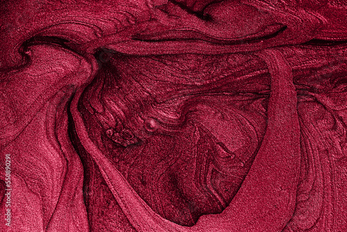 Liquid shimmer background,monochrome red color.