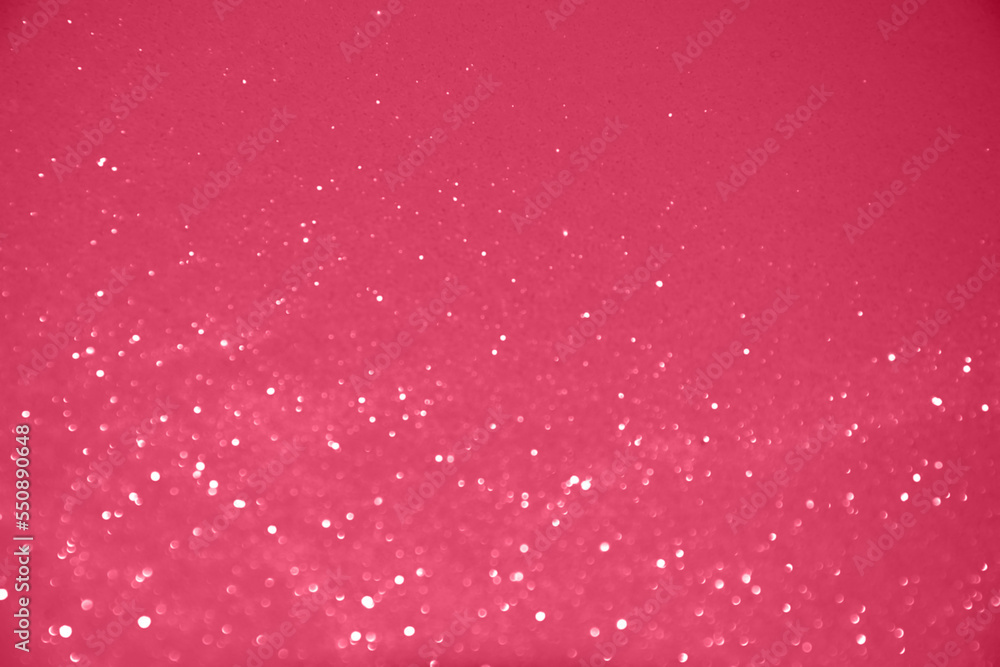 Viva Magenta lights bokeh background, Chrismas lights bokeh. Color of the 2023 year. Blurred and glowing lights. Monochrome bokeh lens effect from lighting spots. Viva Magenta lights bokeh background, Chrismas lights bokeh. Color of the 2023 year. Blurred and glowing lights. Monochrome bokeh lens effect from lighting spots.