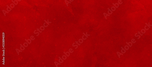 Abstract red wall background texture of an old cement wall. The background texture of the wall is red.