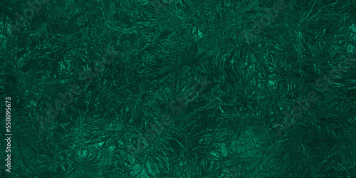 Seamless dark emerald green wrinkled metallic foil Christmas tissue wrapping paper sheet background texture. Shiny festive winter xmas holiday crumpled candy wrapper pattern backdrop. 3D rendering. photo