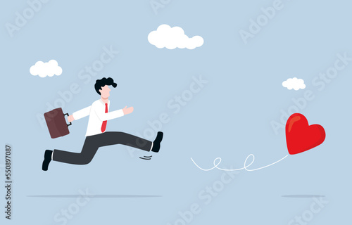 Searching passionate job for happiness, self-motivation to chase dream, ambition to find right career concept. Businessman chasing heart ahead.