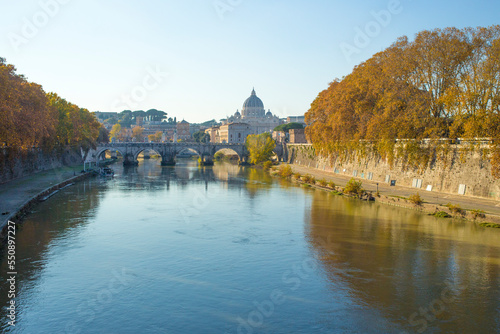 Tiber River near Prati district in Rome, Italy. Autumn colors dye the trees along the river.