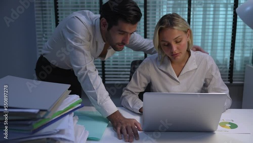 Young Caucasian woman was harassed by a male supervisor at work while she was working overtime at night.