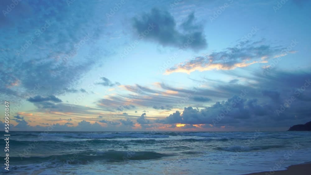 Clouds are moving slowly in the sky during sunset at Karon beach Phuket.video 4K..Nature video High quality footage. .Scene of Colorful romantic sky sunset with cloud in the sky background.. Clouds are moving slowly in the sky during sunset at Karon beach Phuket.video 4K..Nature video High quality footage. .Scene of Colorful romantic sky sunset with cloud in the sky background..