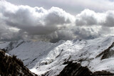 Panorama of snow-capped mountain peaks. Georgian military road. Georgia.