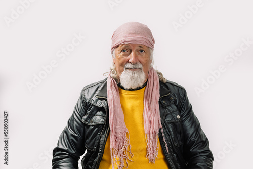 Elderly rocker in leather jacket and bandana photo
