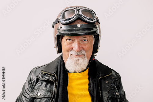 Senior male biker in helmet photo