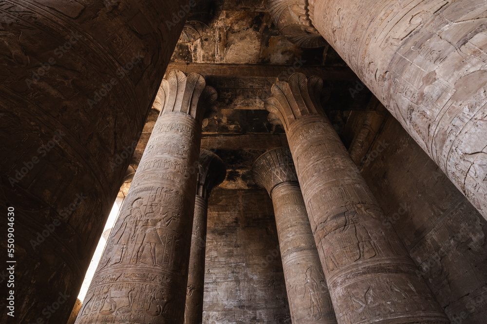Ancient ornamental columns and ceiling in old temple Ancient ornamental columns and ceiling in old temple