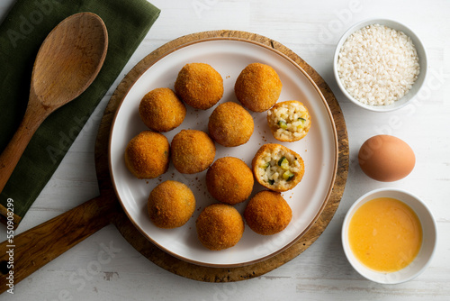 Recipe for arancini with zucchini in a small format similar to a Spanish tapa crequette. photo