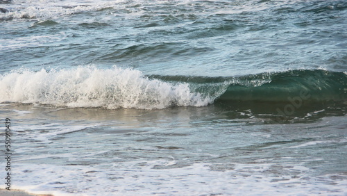 Waves breaking on the beach in Zipolite, Mexico