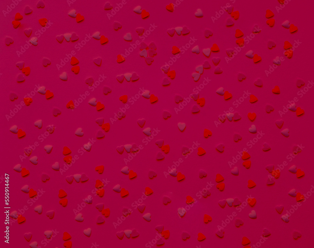 Pattern from hearts in shades of magenta. Color of the Year 2023. Festive Template of greeting card or packaging design. 