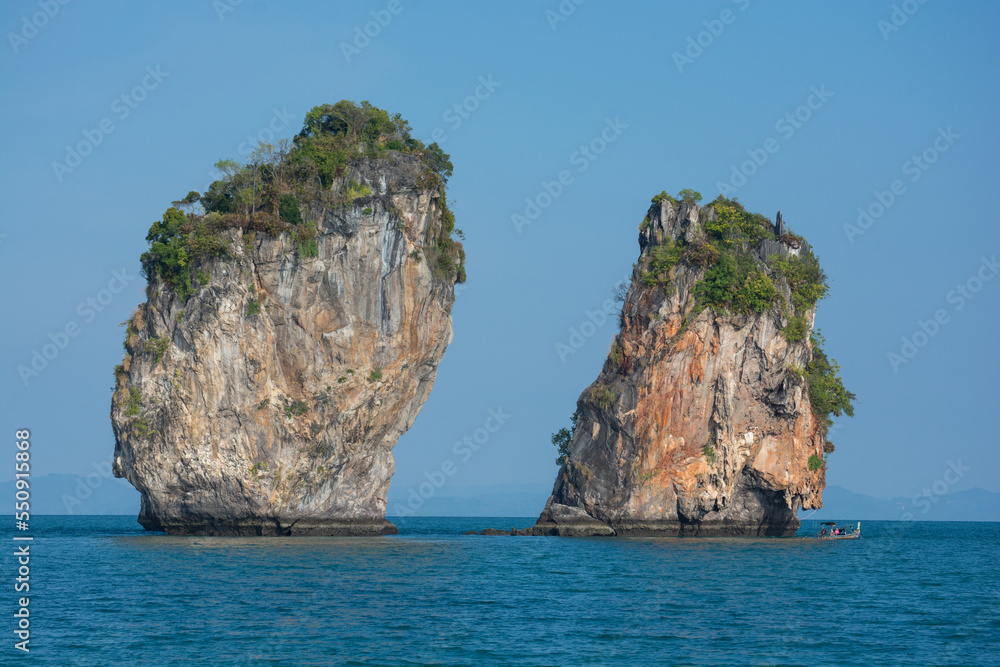 Rocks in the Andaman sea. Traditional fishing in the Thailand 