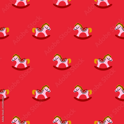 Seamless red pattern with rocking horses. Cute kids xmas background. Brigh colors child play illustration.
