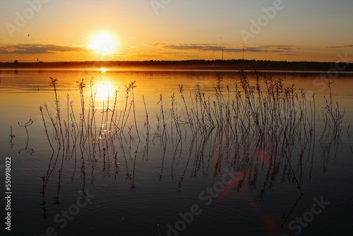 Beautiful orange sunset over river