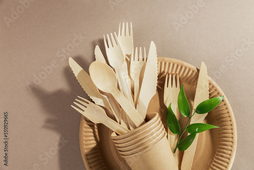 Panel kuchenny z motywem Disposable tableware from natural materials, wooden spoon, fork, knife. Biodegradable plate, Compostable cutlery