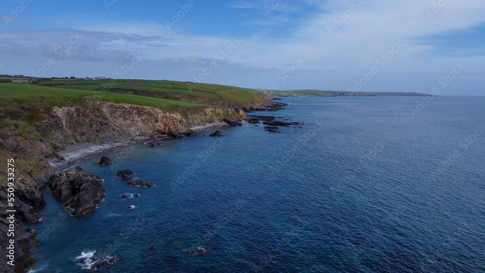 Obraz premium The southern coast of Ireland, top view. Blue sea space. Seascape. Aerial photo.