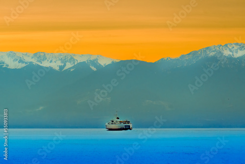 Ferry on the Sea at Sunset