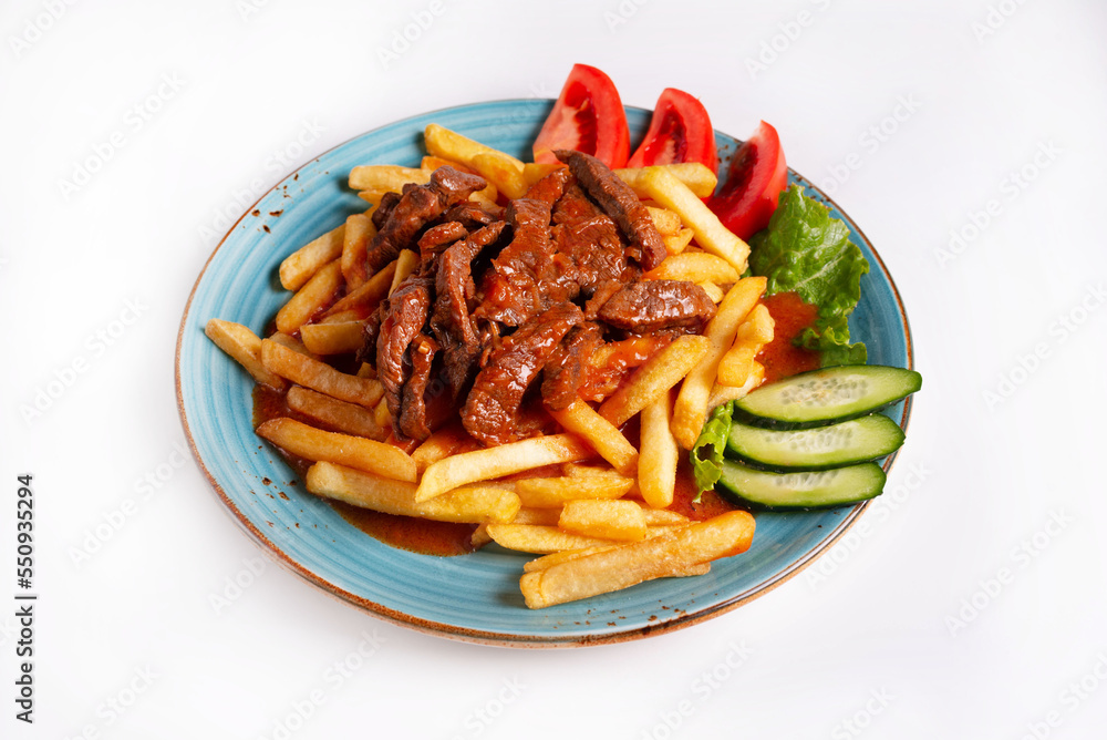 potatoes with meat and fresh tomatoes and cucumbers on a white background potatoes with meat and fresh tomatoes and cucumbers on a white background
