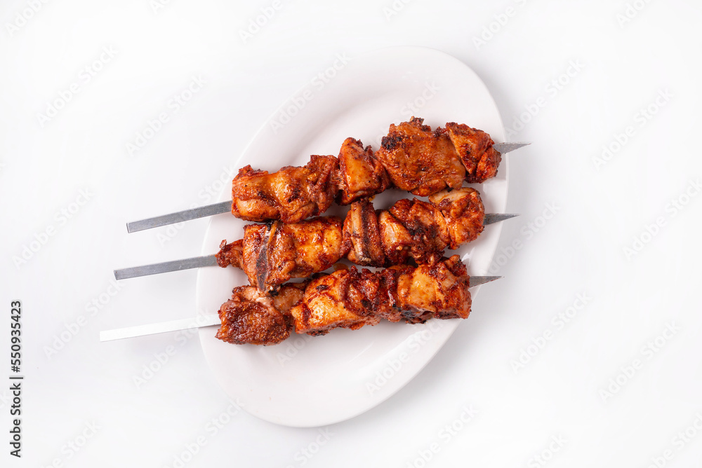 chicken meat kebab on a white background