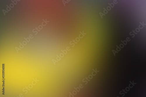 Black and yellow abstract blurred background. Blurry dark wallpaper. Dark black and yellow minimalist gradient background.